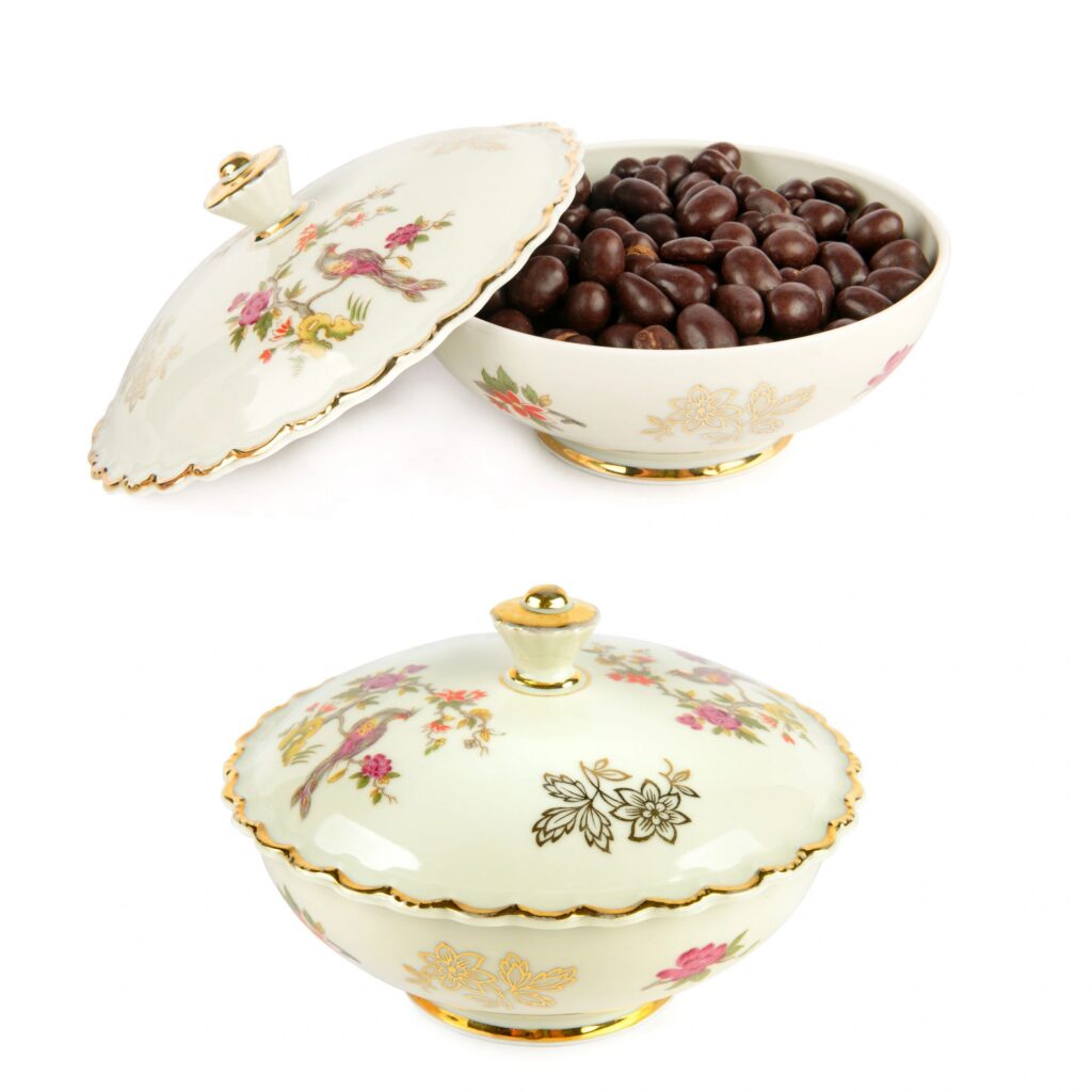 Antique ceramic candy dish with ornate flower and bird patterns